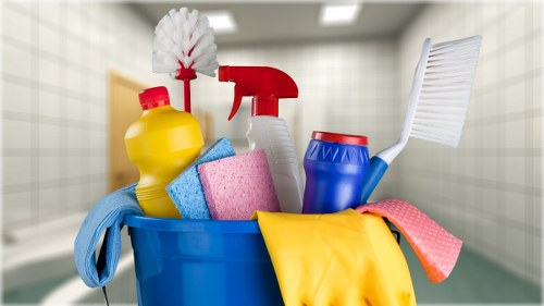 Professional carpet cleaner in Kennington working on a living room carpet