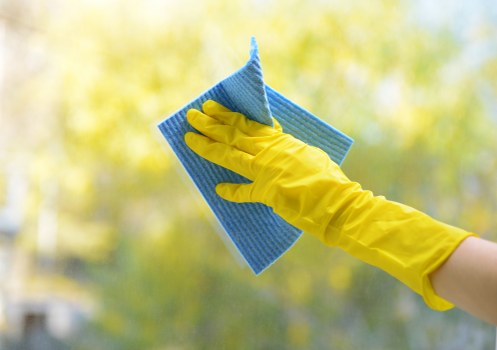 Staff following safe handling procedures during cleaning work