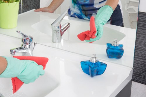 Safety-focused cleaning in a Kennington property with protective equipment